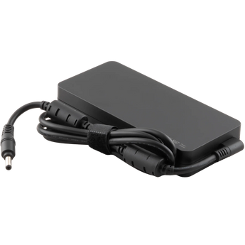Schrägansicht des schwarzen XMG / SCHENKER 330 Watt Netzteils mit fest verbundenem Stromkabel inklusive Ferritkern und rundem Steckeranschluss.