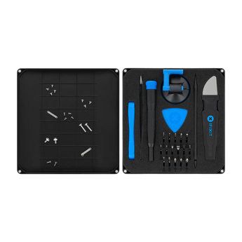 Geöffnetes iFixit Essential Electronics Toolkit in Draufsicht mit sortierten Schrauben im Deckel und Werkzeug im Schaumstoff-Inlay.