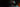 Junger Gamer mit Headset spielt in stimmungsvoller RGB-Beleuchtung an einem High-End-Laptop.