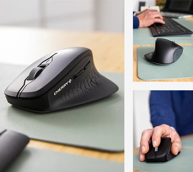 Ergonomische CHERRY PC-Maus in Schwarz auf einem Schreibtisch mit Daumenauflage und Scrollrad