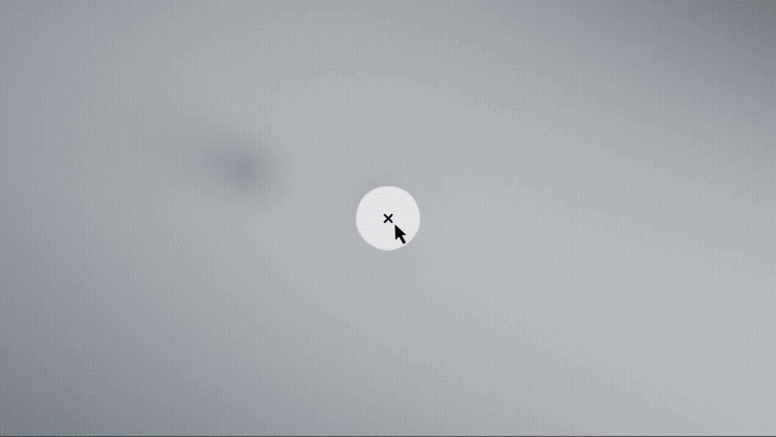Cursor zeigt auf einen hellen Punkt auf grauem Hintergrund.