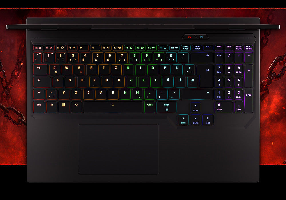 Nahaufnahme der RGB-beleuchteten Gaming-Laptop-Tastatur von oben mit Ziffernblock.