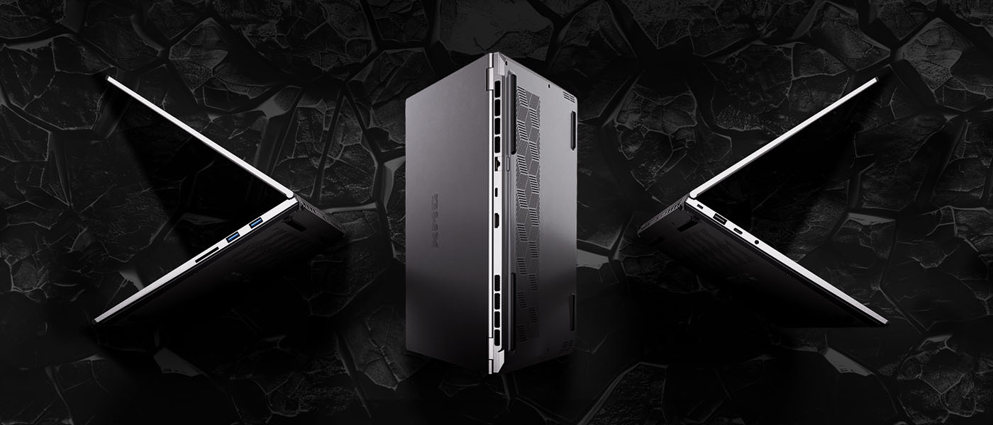 Drei XMG Gaming-Laptops in verschiedenen Perspektiven vor einem dunklen Felsenhintergrund