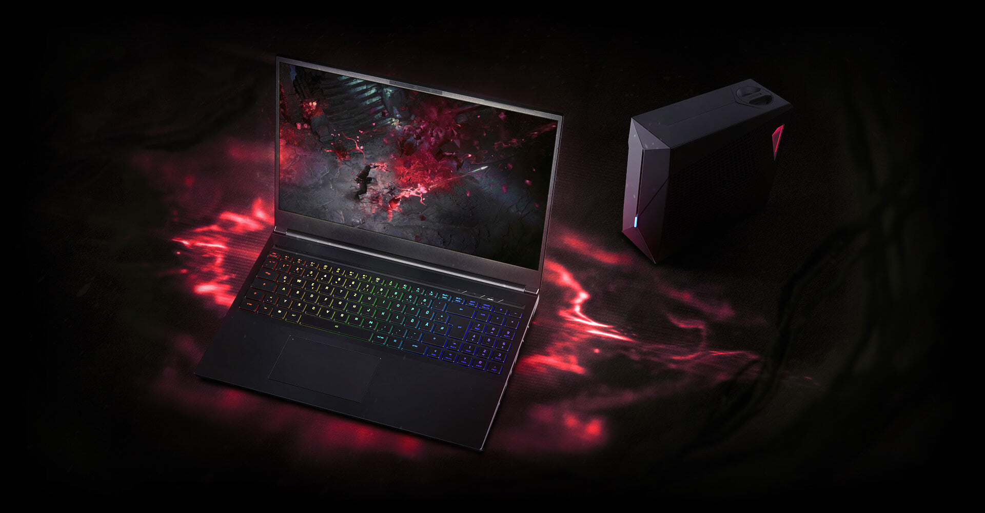 Hochleistungs-Gaming-Laptop mit RGB-Tastatur und externer Wasserkühlung auf dunklem Untergrund mit roter Beleuchtung