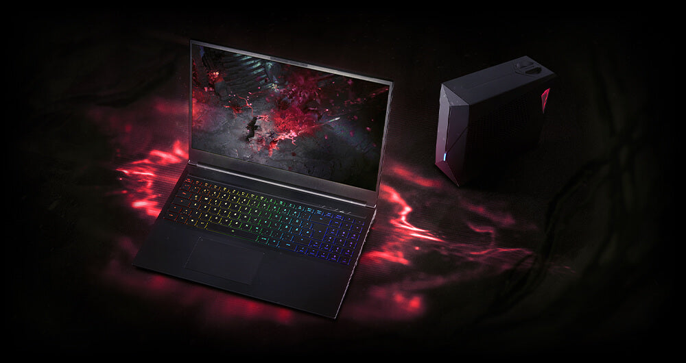 High-End Gaming-Laptop mit roter Beleuchtung und externer Grafikkarte auf dunklem Untergrund.