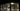 3D-Grafiksoftware mit Raytracing-Echtzeit-Renderings und Materialeinstellungen auf dunklem Tisch