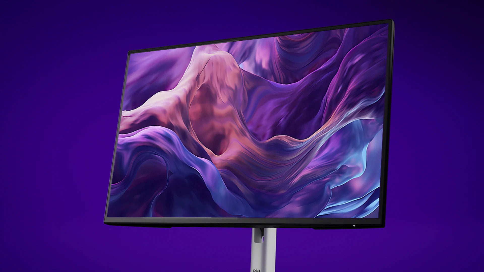 Moderner Dell Monitor mit hochauflösendem, violettem abstrakten Display-Hintergrund vor lila Hintergrund