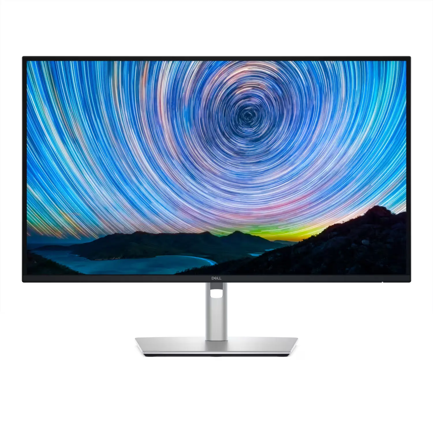 Dell Monitor mit schmalem Rahmen und einem farbenfrohen Wallpaper von rotierenden Sternen über einer Küstenlandschaft.